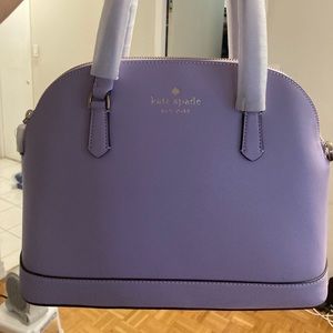 Kate spade bag never worn comes with packaging